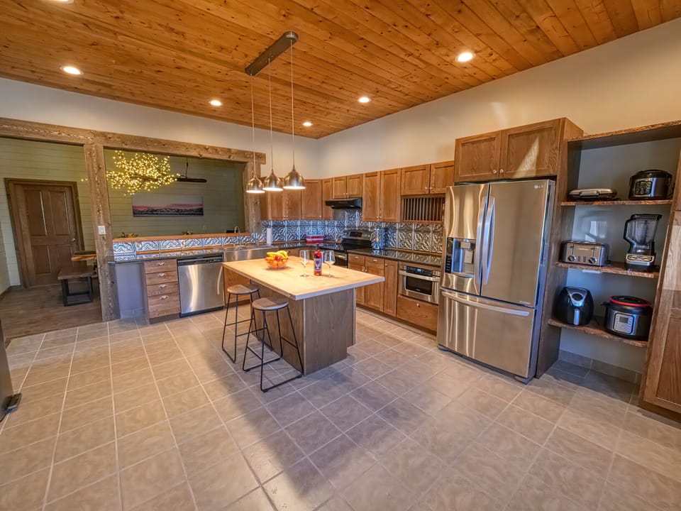kitchen has new appliances and many small appliances to fit your needs