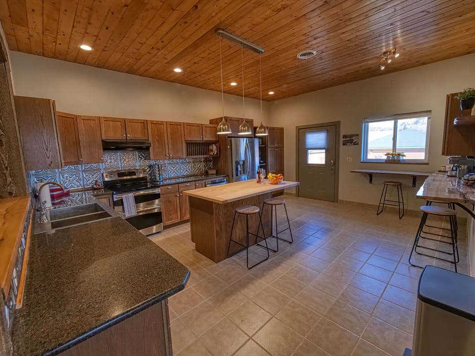 Large kitchen to gather and prepare meals 