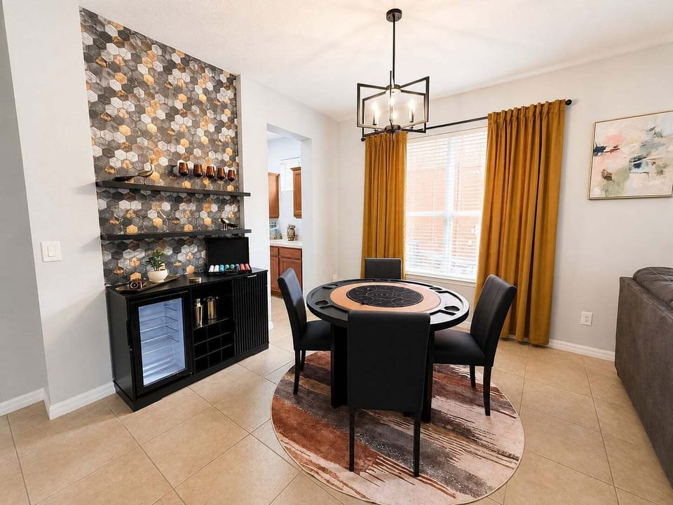 Fun bar area with built in fridge and card table