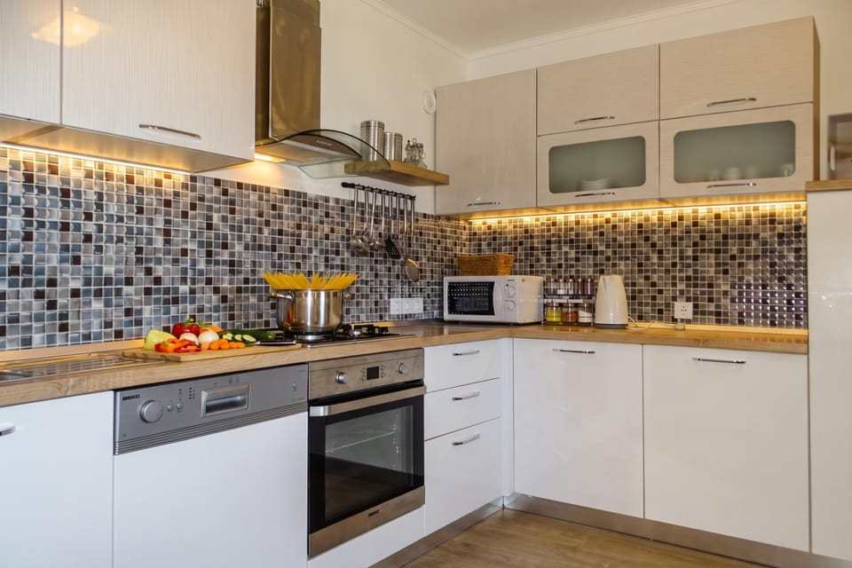 Family Villa, 4 Bedrooms, 2 Bathrooms (Villa Cujez with Pool & Sauna) | Private kitchen | Stovetop, electric kettle, dining table