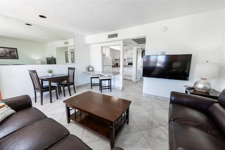 Apartment, 1 Bedroom | Living area | Fireplace