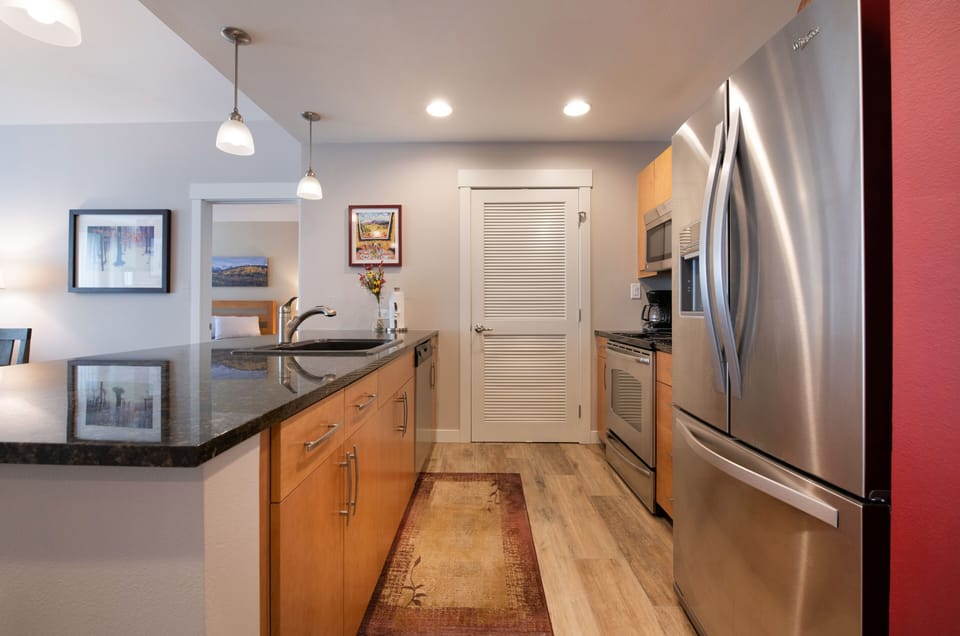 Condo, 2 Bedrooms | Private kitchen | Fridge, oven, coffee/tea maker, toaster