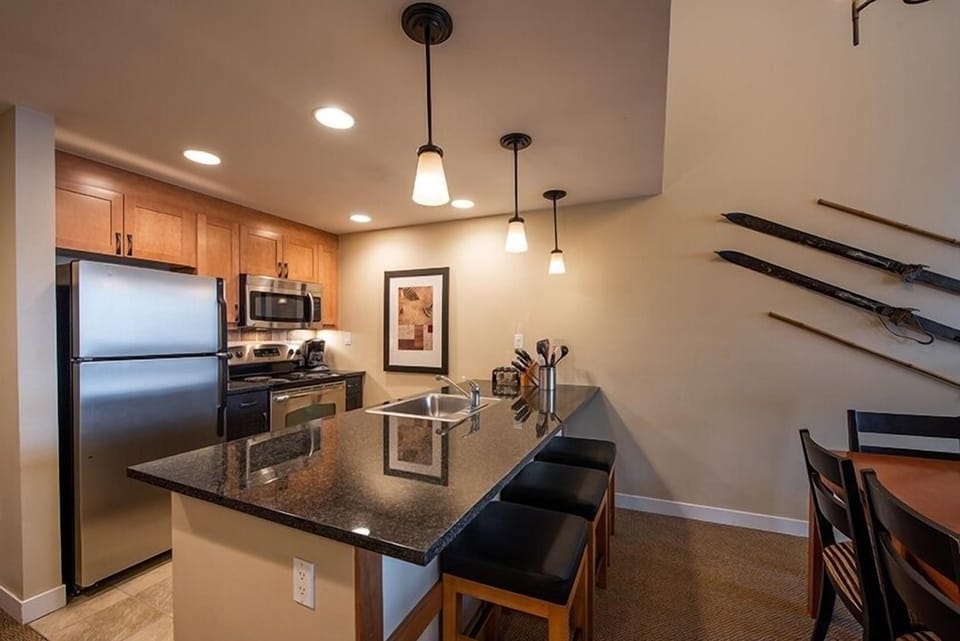 Condo, 2 Bedrooms | Private kitchen | Fridge, oven, coffee/tea maker, toaster