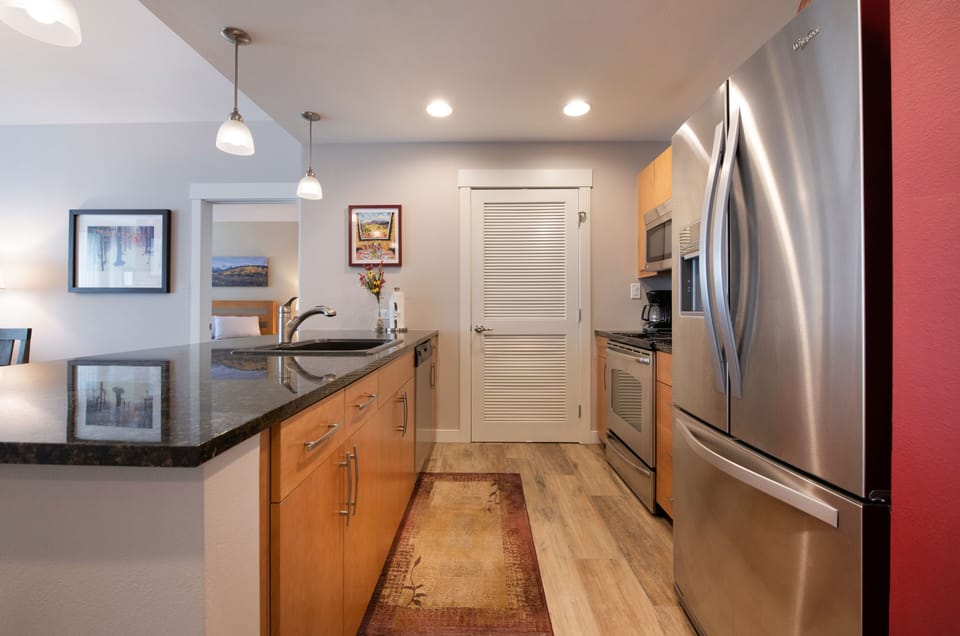 Condo, 2 Bedrooms | Private kitchen | Fridge, oven, coffee/tea maker, toaster