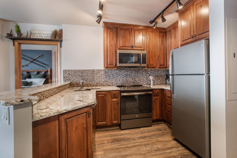 Condo, 2 Bedrooms | Private kitchen | Coffee/tea maker, fridge, oven, toaster