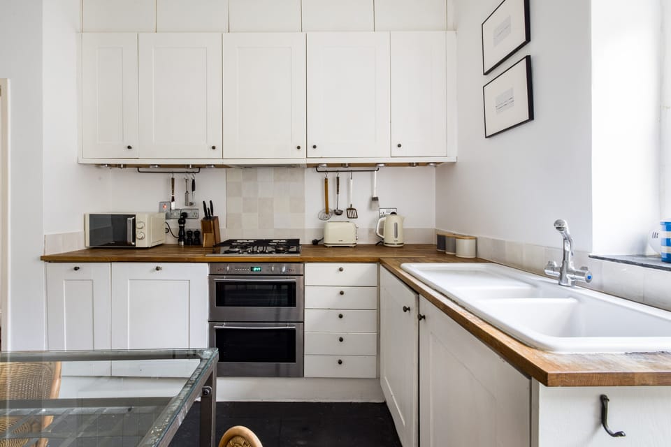 Apartment | Private kitchen | Full-size fridge, microwave, oven, stovetop