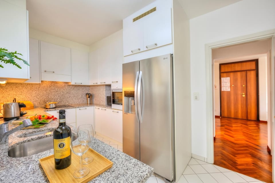 Family Apartment, 2 Bedrooms, Refrigerator & Microwave (Residenza Parco Carona with Lake-View) | Private kitchen | Espresso maker, stovetop, electric kettle
