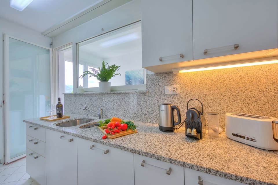 Family Apartment, Multiple Bedrooms, Refrigerator & Microwave, Mountainside (Residenza Parco Carona) | Interior