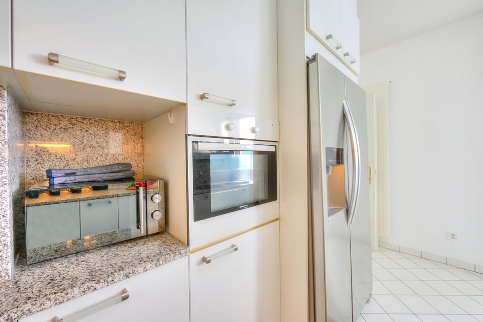 Family Apartment, 2 Bedrooms, Refrigerator & Microwave (Residenza Parco Carona with Lake-View) | Private kitchen | Espresso maker, stovetop, electric kettle