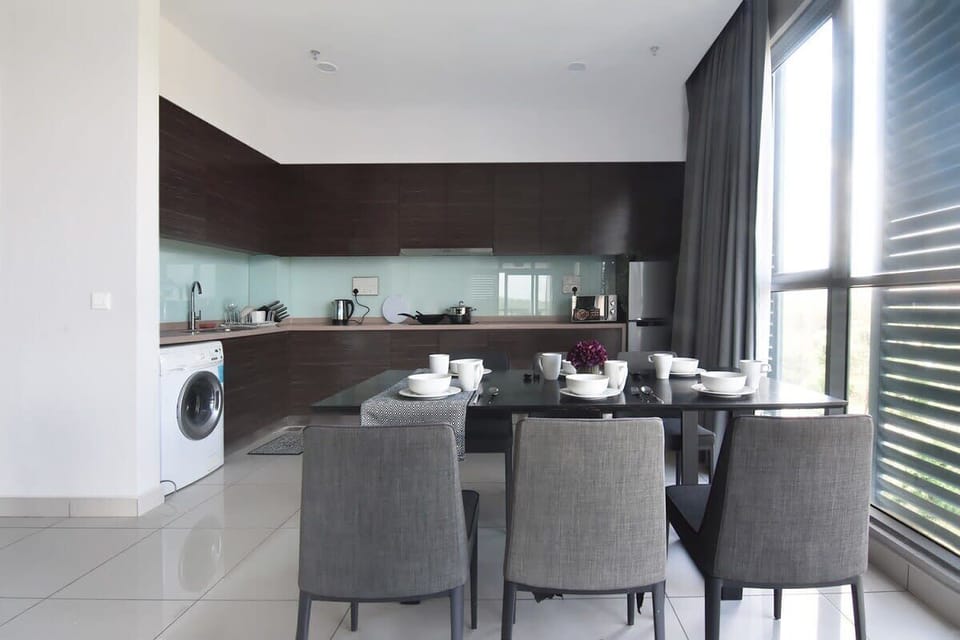 The dining area and fully-equipped kitchen.