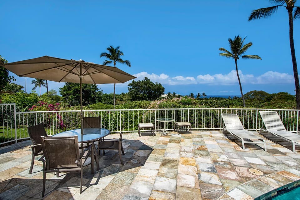Enjoy the ocean breeze from the pool deck, just a short walk from the condo.