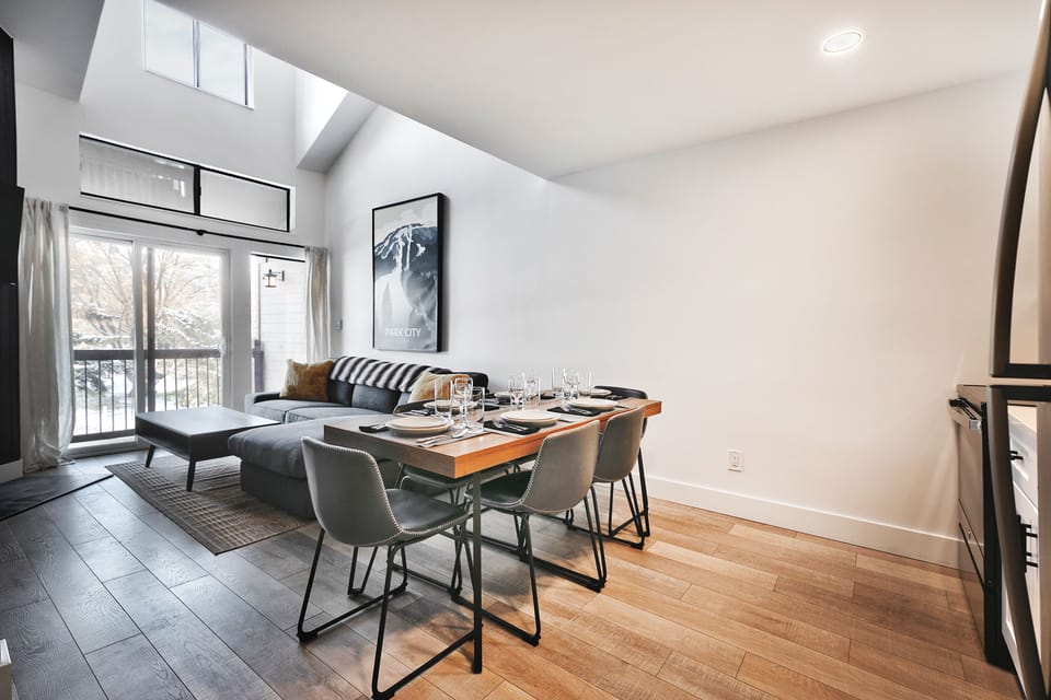 Open floor plan with the kitchen, dining, and living area, hardwood floors throughout