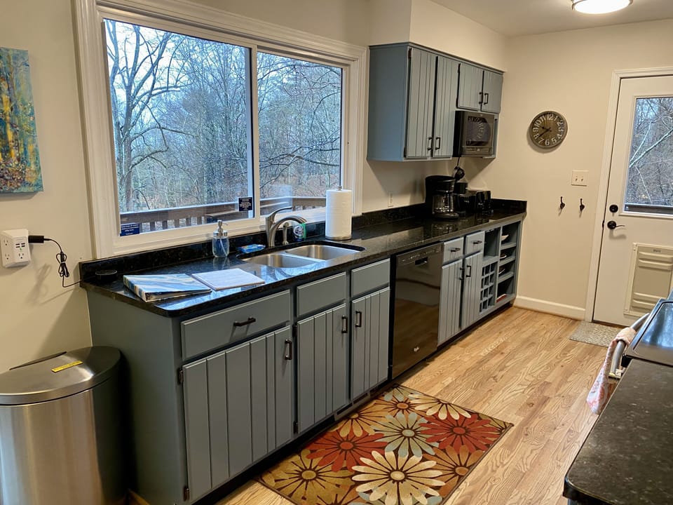 Kitchen (sink, dishwasher, microwave, drip coffee maker, Keurig
