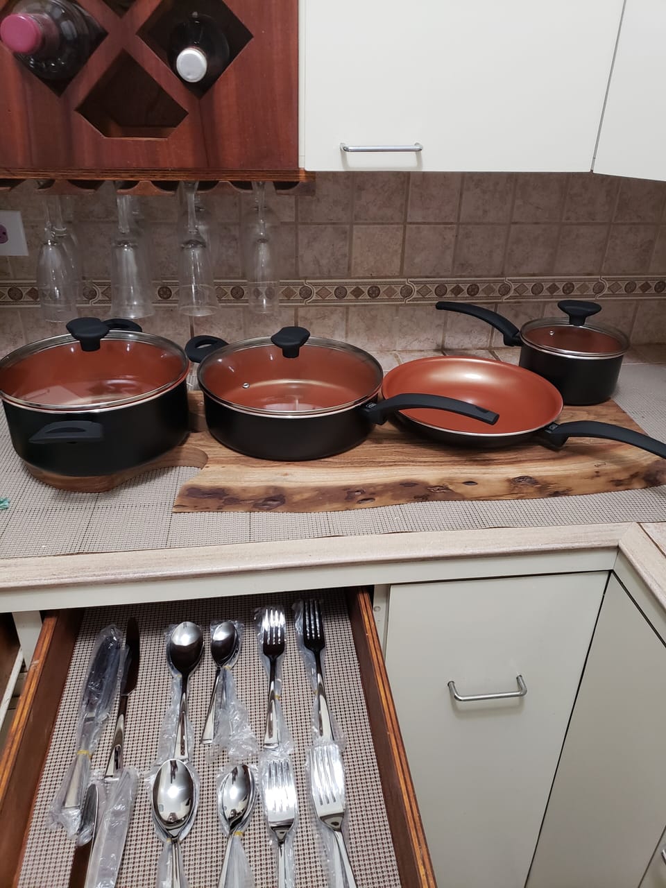 wine rack, wine glasses, pots, pans, & utensils 