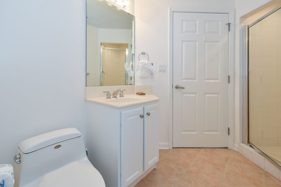 Silver Beach Towers East 1006 - Hallway Guest Bathroom with Walk-In Shower