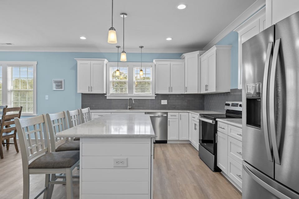 Large Kitchen island offers additional seating for four 