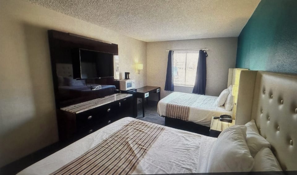 Blackout drapes, iron/ironing board, free WiFi