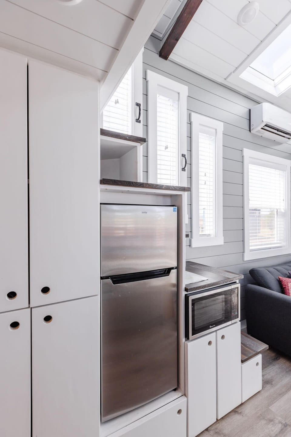 Kitchen fully equipped with a refrigerator, freezer, microwave, stove, oven and sink with hot/cold water. Enjoy coffee from the coffee maker and ample counter space. Essentials include cookware, dishes, utensils, and plenty of storage cabinets.
