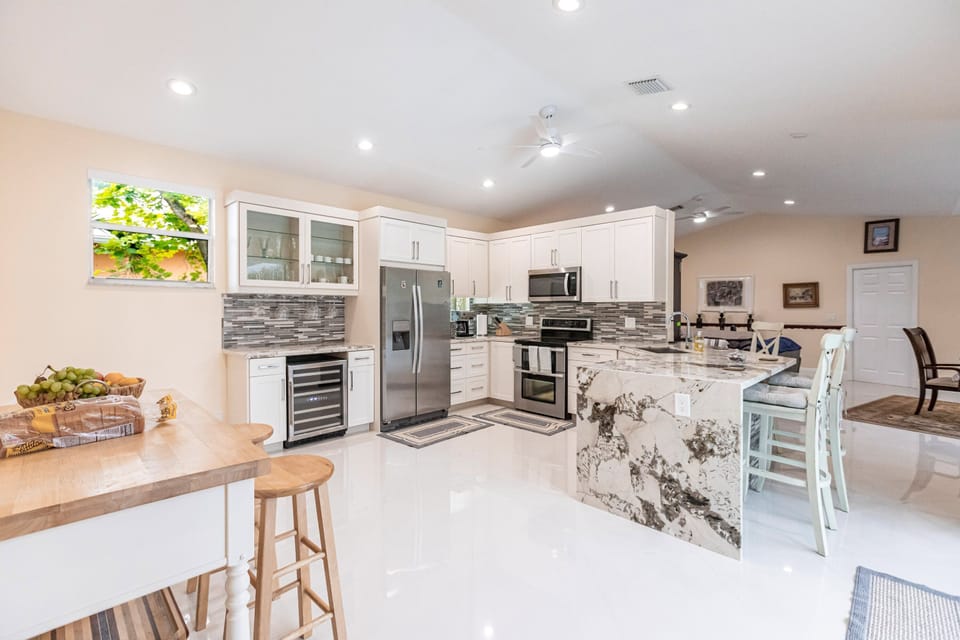 Natural Quartz counter top with bar stools