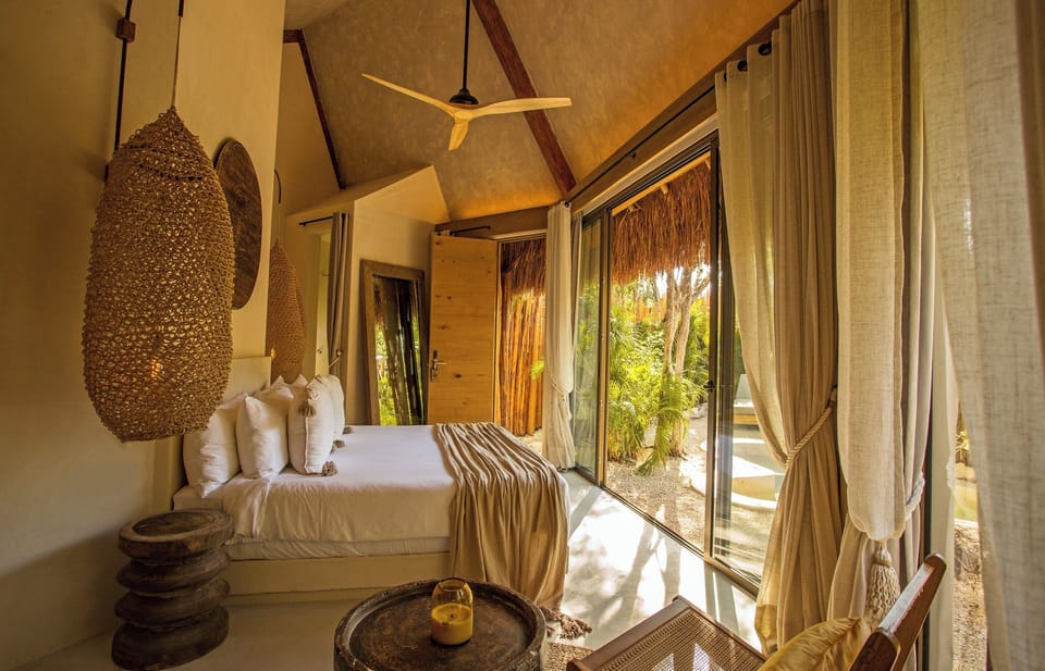 Muare Suite | Living area | Books, printers