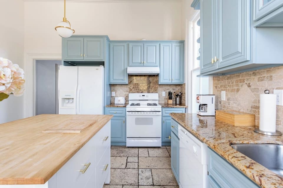 Fully stocked kitchen with blender, mixer, baking sheets, coffee pot, dishware, cooking wear, and more…. plus coffee, creamer, and oatmeal provided.