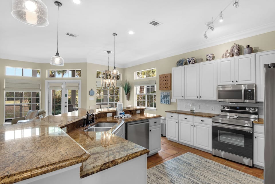 Bright and open kitchen to dining and living areas