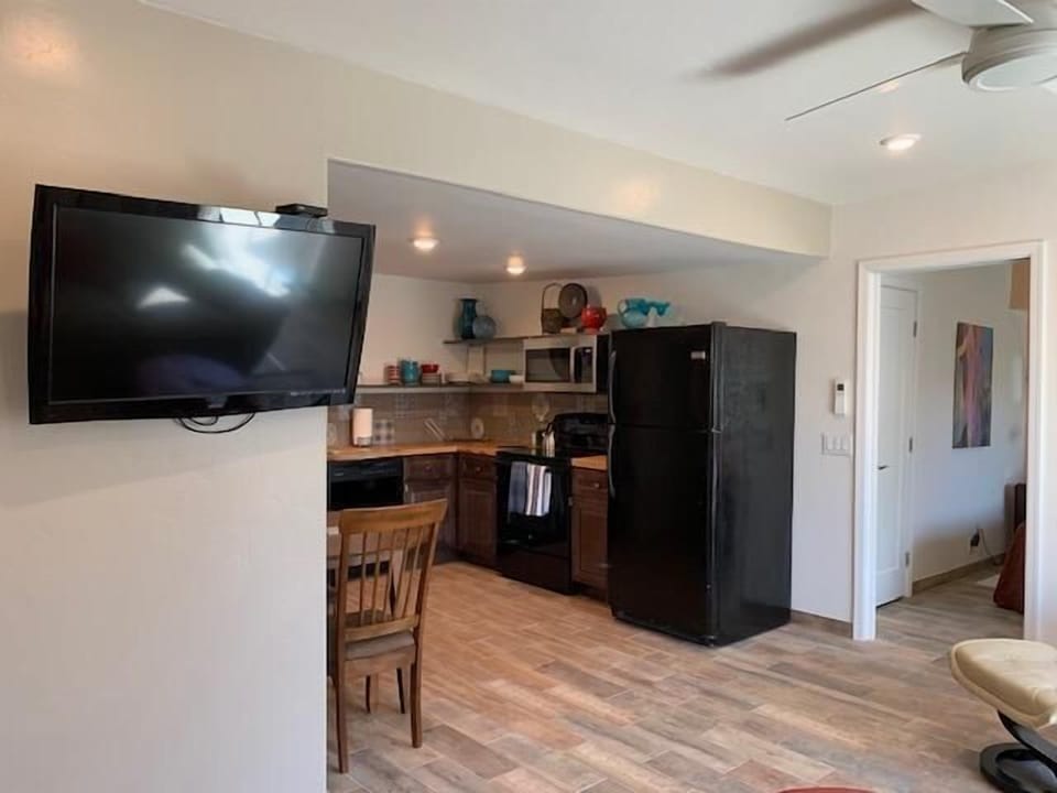 Living room looking toward kitchen and dining area.