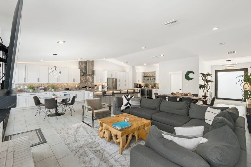 Spacious living area with direct access to the dining and kitchen for seamless open-concept living.