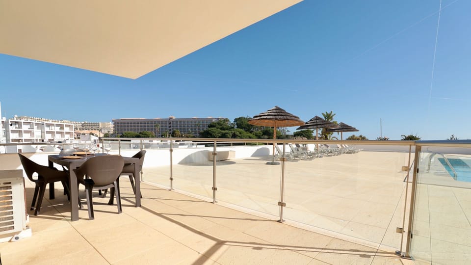 Dive into the inviting swimming pool, surrounded by sun loungers, and soak up the glorious sunshine.
#SwimmingPool #OutdoorLiving #LovelyStay