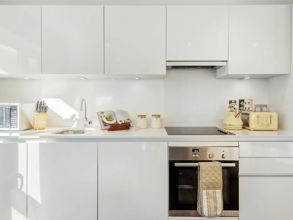 Cabinetry, Countertop, Kitchen Appliance, Kitchen Stove, Kitchen, Tap, Home Appliance, Flooring, Shelving, Floor