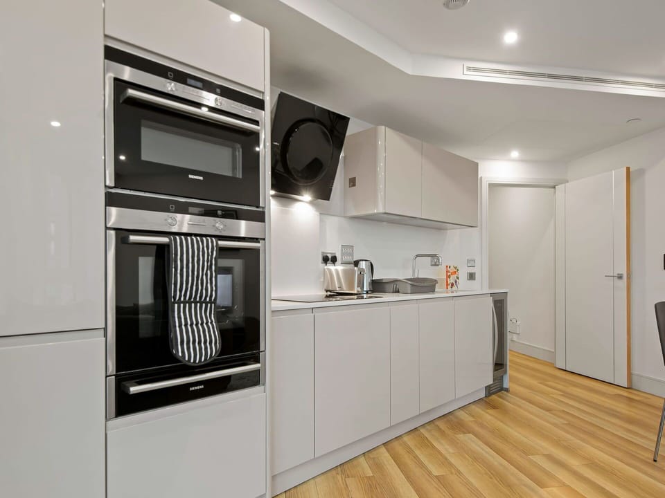 Kitchen Appliance, Kitchen, Major Appliance, Interior Design, Flooring, Ceiling, Cabinetry, Wood, Furniture, Home Appliance