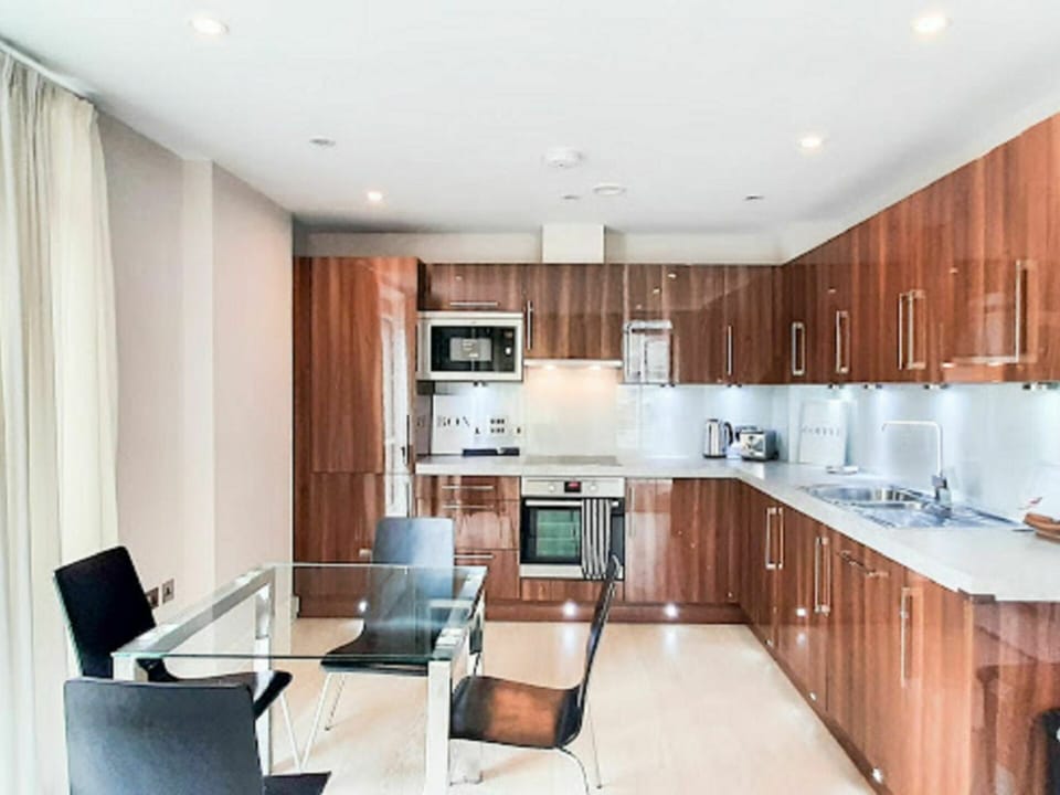 Cabinetry, Furniture, Property, Countertop, Building, Sink, Houseplant, Chair, Tap, Wood