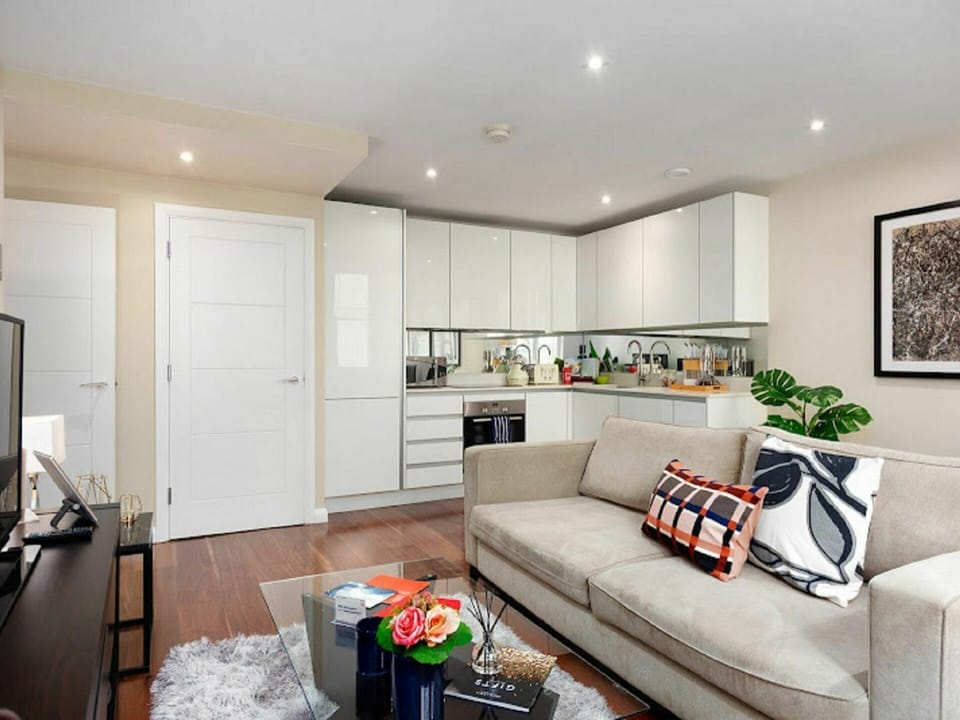 Couch, Picture Frame, Property, Table, Furniture, Living Room, Flooring, Interior Design, Floor, Studio Couch