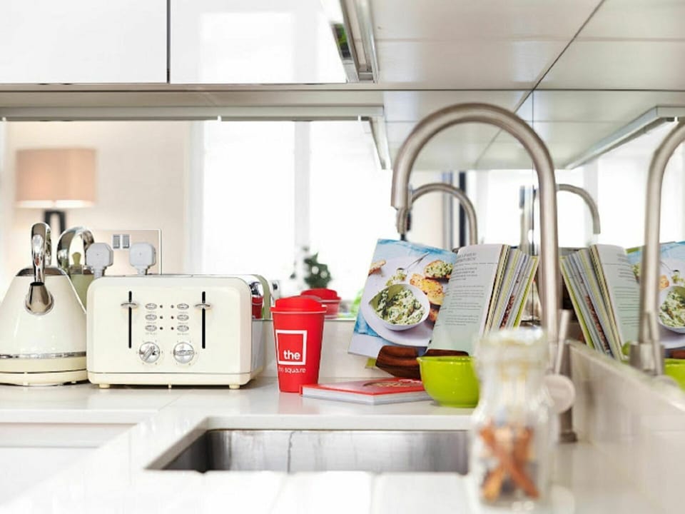 Countertop, Kitchen Appliance, Tap, Cabinetry, Kitchen, Home Appliance, Kitchen Stove, Interior Design, Tableware