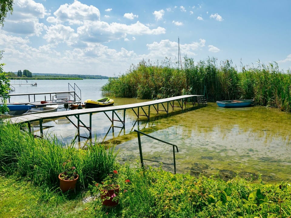 Water, Sky, Cloud, Plant, Water Resources, Natural Landscape, Natural Environment, Boat, Lake, Land Lot