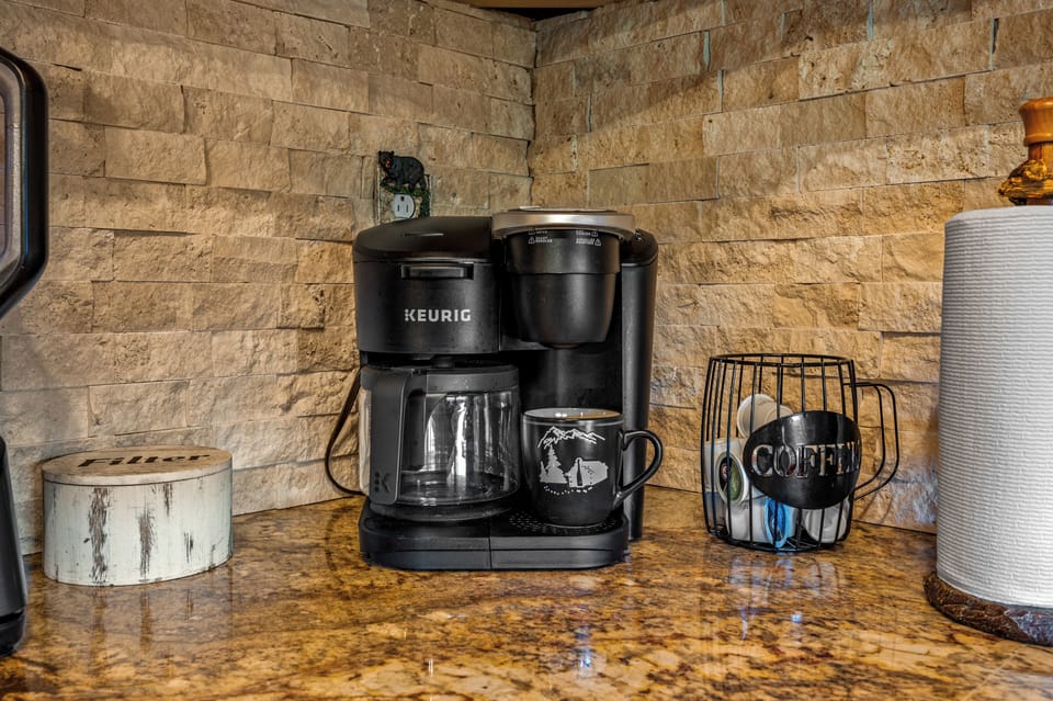 Keurig coffee maker with k-cups provided.