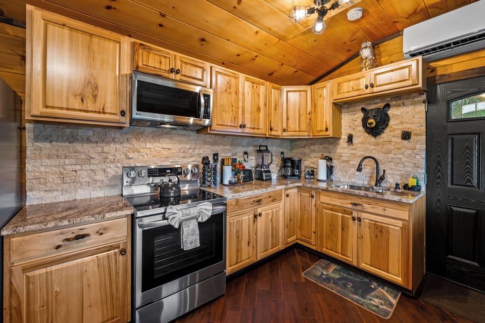 Fully stocked kitchen, with pots/pans, keurig, blender, spices, ect. 