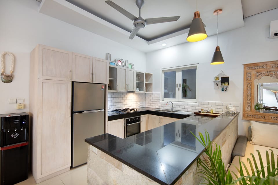 Full-size fridge, microwave, stovetop, toaster