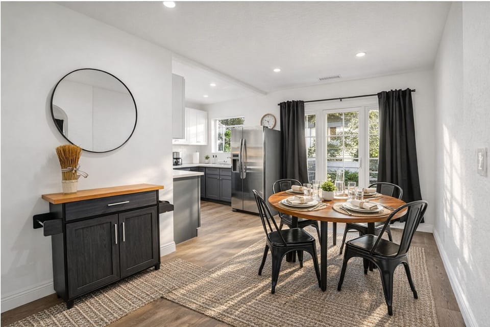 Dining space with natural light, perfect for meals at home or working remotely during your Pasadena stay.