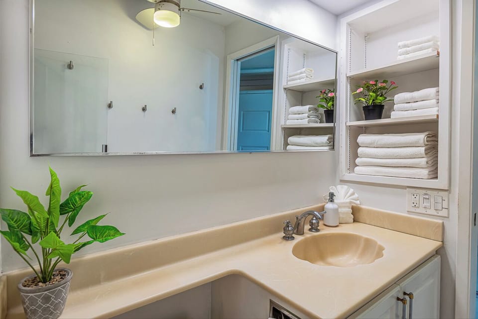 Fresh towels and thoughtful touches welcome you in this bright, well-stocked bathroom—your private retreat after a day of adventure.