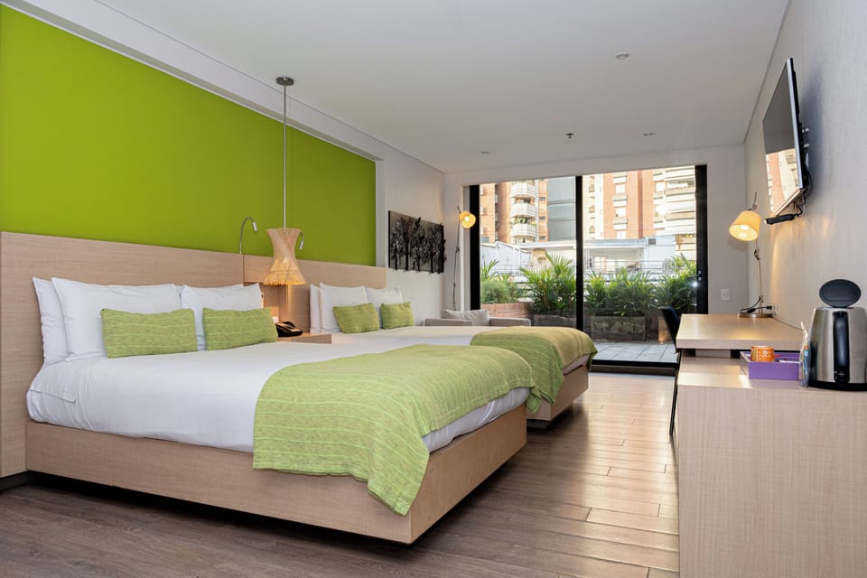 Standard Twin Room | Minibar, in-room safe, desk, laptop workspace