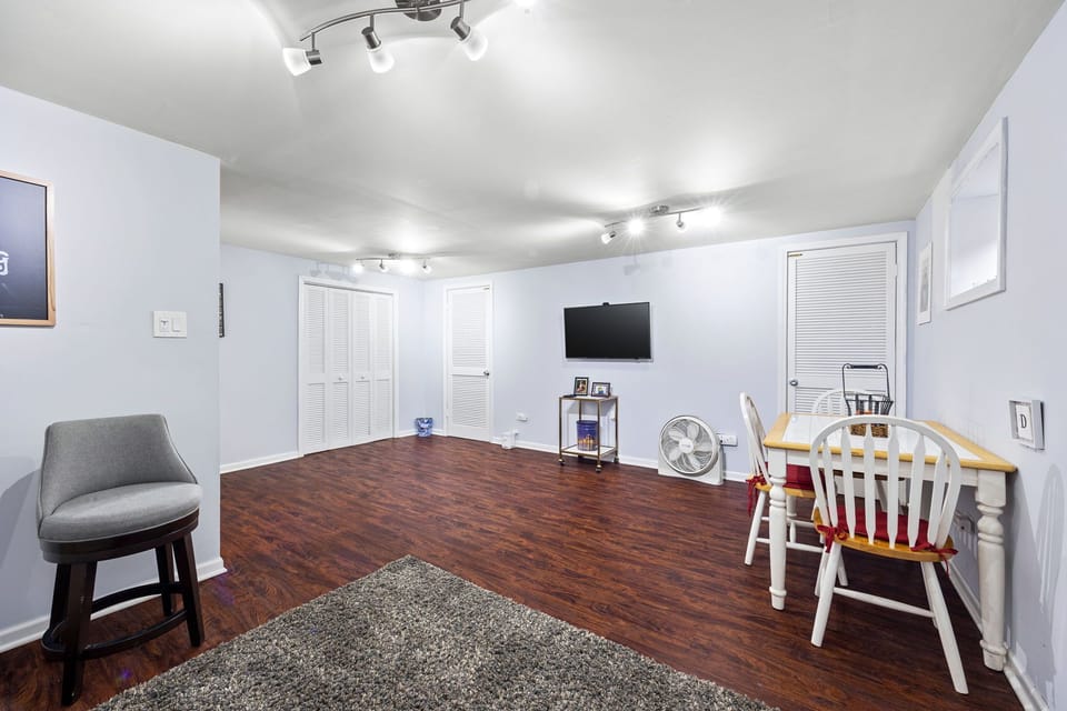 Basement with sofa bed, working area