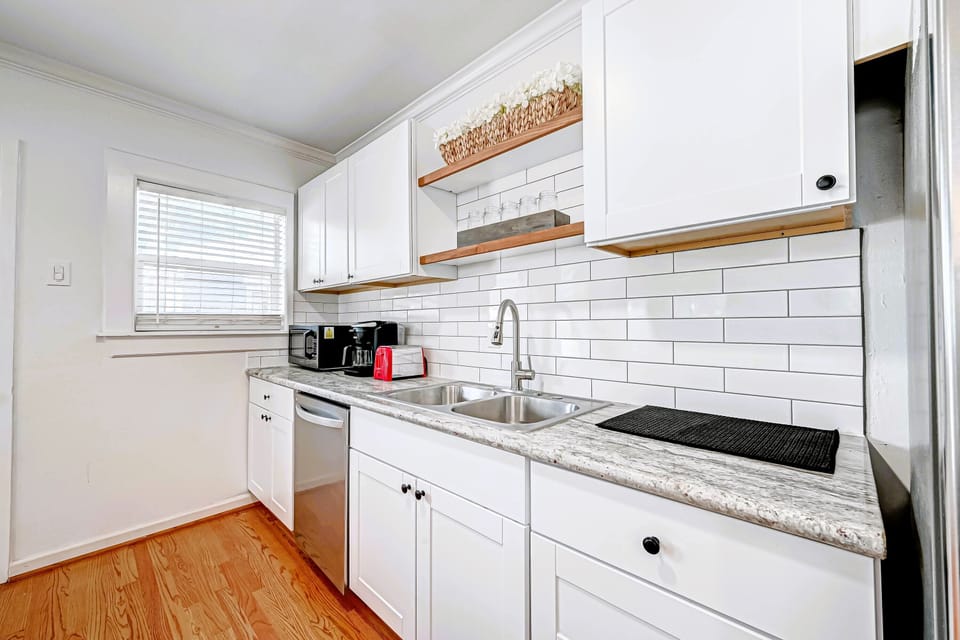 Kitchen including microwave, toaster and Keurig Dual Coffee Maker. 