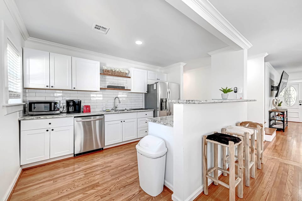 Full kitchen & bar including microwave, toaster and Keurig Dual Coffee Maker. 