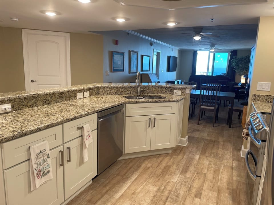 Fully stocked kitchen includes quiet dishwasher