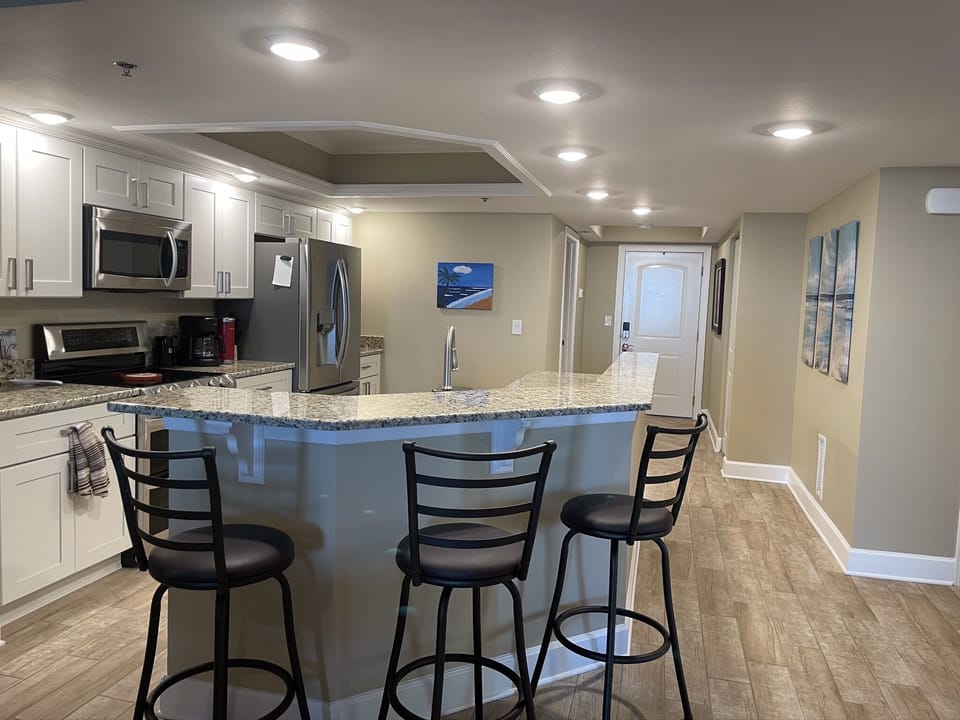 Seating for three at the island breakfast bar