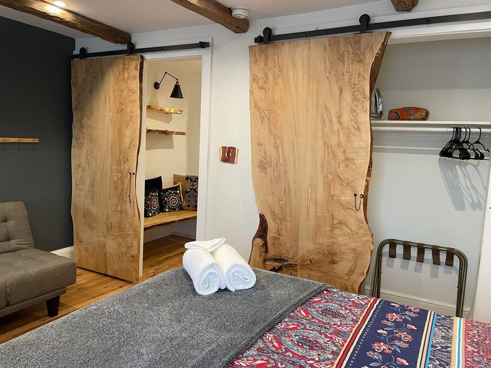 View of live edge wood doors in bedroom #1