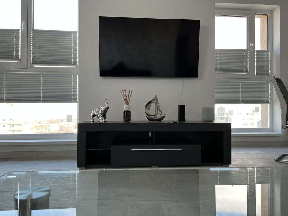 Presidential Apartment | Living room | 55-inch Smart TV with cable channels, TV, video-game console