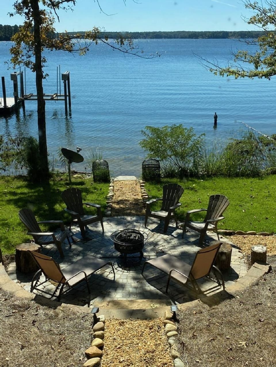 Family sized circle patio with fire pit. Free firewood provided onsite.