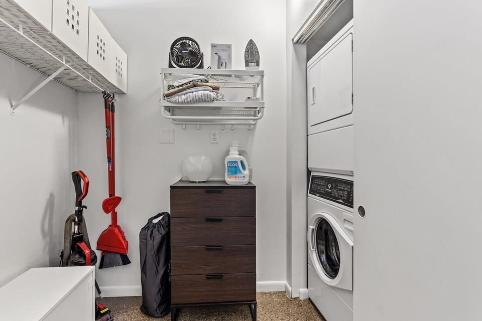 Dresser, hangers, iron, ironing board, a luggage rack (not pictured) and a Speedy Queen laundry set. Detergent & wool dryer balls provided. 